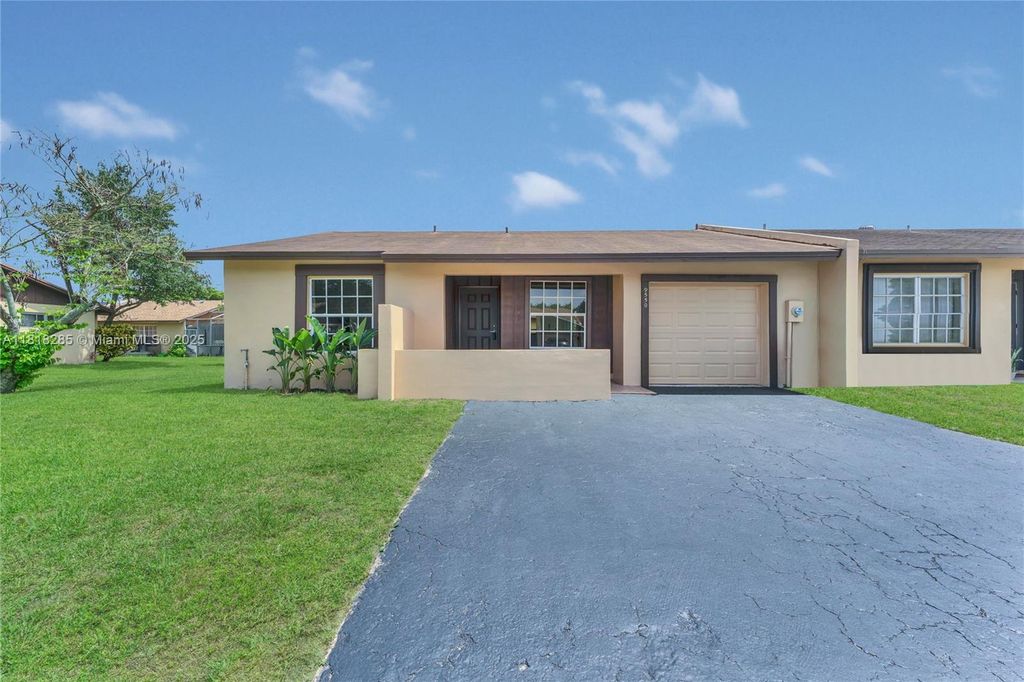 Photo of 9550 W Heather Ln, Miramar, FL 33025 (MLS # A11818285)