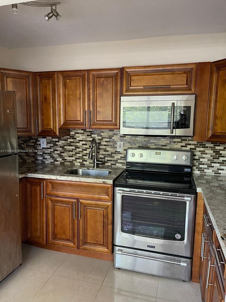 PALMS AT DANIA BEACH (THE - Residential