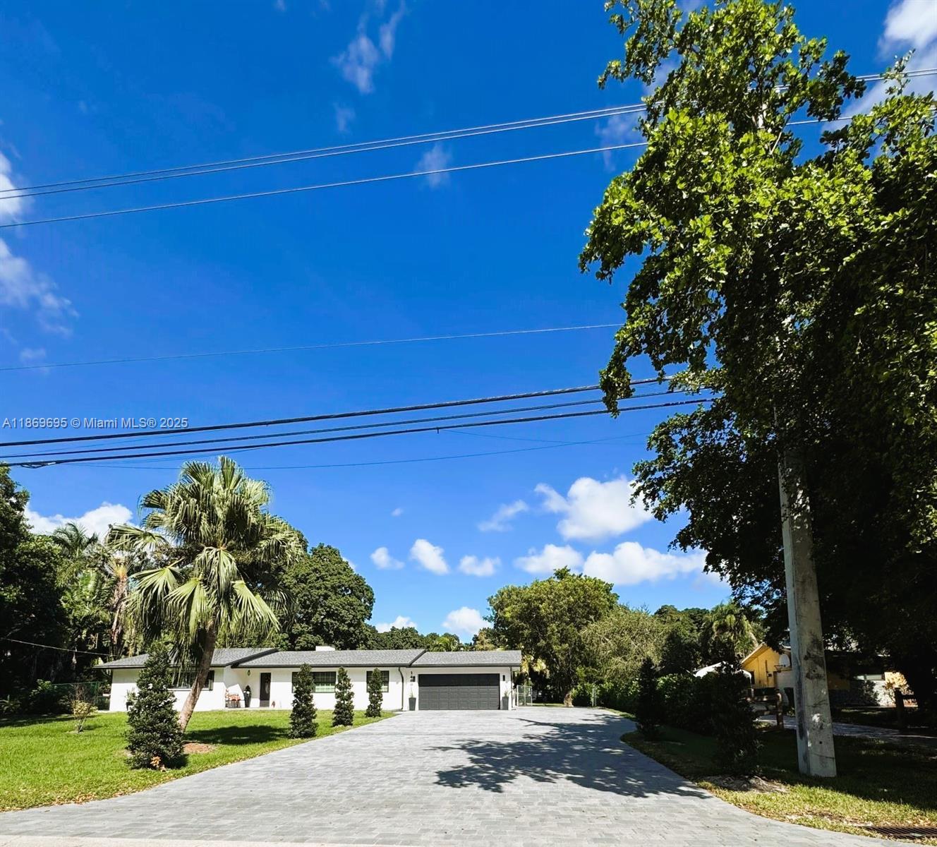 Discover a truly rare gem in Davie, living in the countryside in the city:this 4 Bedrooms, 2 renovates bath spans nearly 1930sqft on an expansive 0.99 acre,no-HOA lot that invites horses, chickens, goats, Rvs and play.You love the chef-ready kitchen with granite counters, stainless steel appliances and a double oven. Enjoy peace of mind with impact glassdoor/windows, a whole-house generator (2018), newer Rheem AC (2016), updated water heater(2018), new roof (2024),water system filter (2025), Septic Tank (2025) new driveway(2024).Luxuriate under the marble floors, crown molding and a wood-burning fireplace. Screened patio, a beautifully manicured backyard, mangos trees, guava,coconuts,anon, complete this private retreat, your perfect blend of elegance, comfort and florida lifestyle!!
