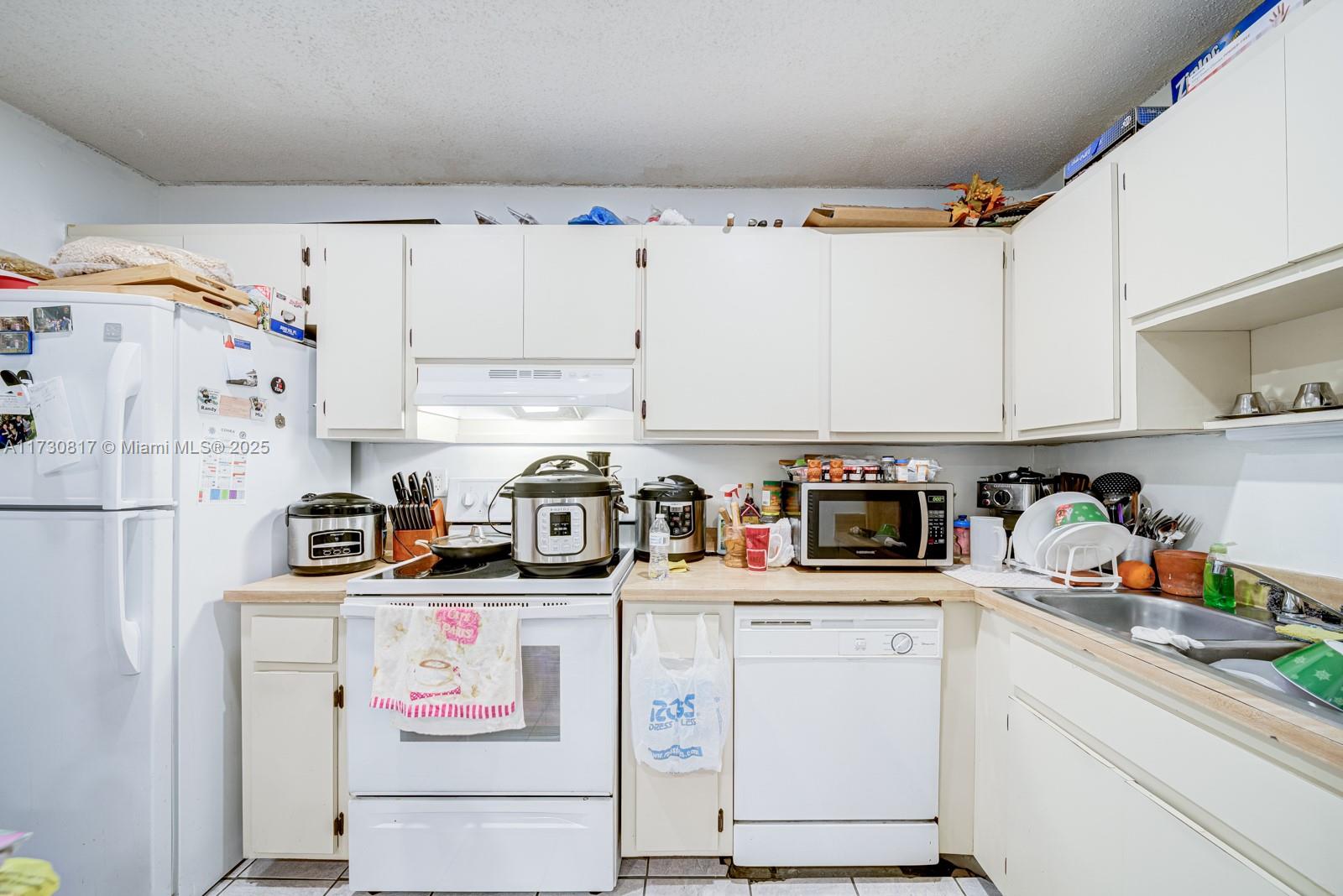 MILLER VILLAS CONDO - Residential