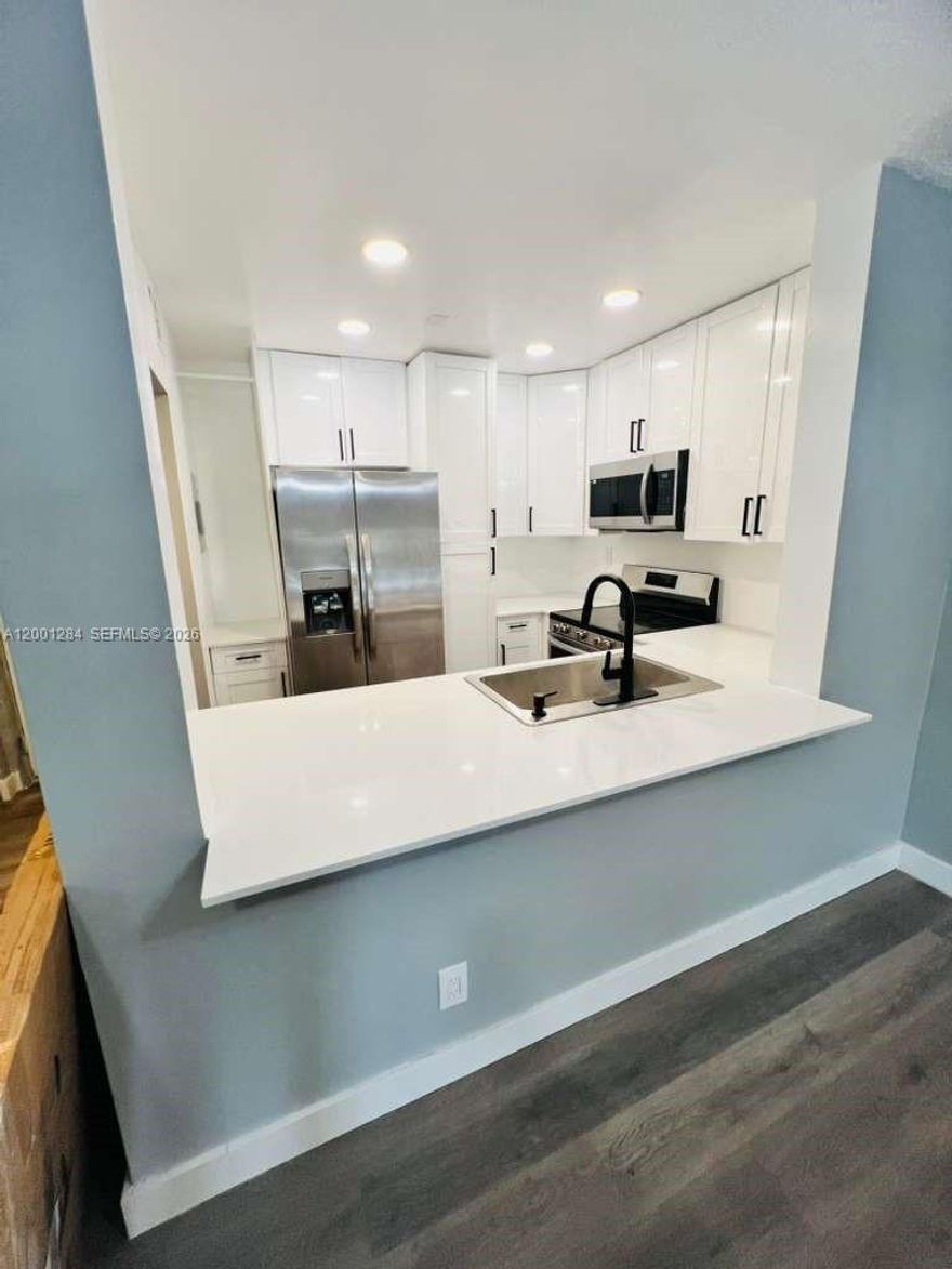 Beautifully remodeled 2-bedroom, 1-bath unit featuring a semi-open kitchen with brand-new appliances and modern finishes throughout. Includes brand-new washer and dryer in unit. Located in the heart of Coral Springs with a strong rental demand. Community offers pools, tennis courts, and well-maintained grounds. Excellent opportunity for those seeking long-term appreciation and future rental income.