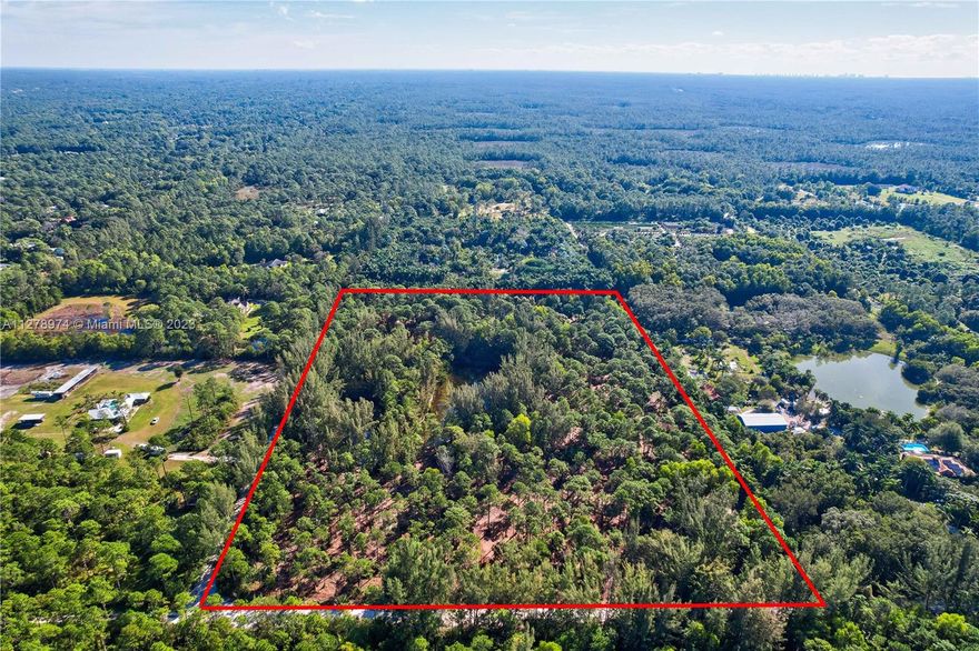 11.25 Acre Vacant Parcel- Zoned Agricultural/Residential, Bring your horses or animals. Grow your Organic Garden or Tree Far.  Bring all your toys/equipment. 2 ponds already on property. Paradise Awaits, Come build your Dream Home. Located in Unincorporated Northern Palm Beach County. Wooded Lot has been cleared of most Scrub, but the beautiful old Florida Pines & Palms remain. Two lakes already on property and NO HOA.   Wind in the Pines is a peaceful community where you can enjoy the outdoor lifestyle & build Barns for all you Horses, Animals, RVs, Boats & Toys. Convenient to Palm Beach Gardens, Restaurants and Palm Beach International airport, however you are in a rural quiet area.