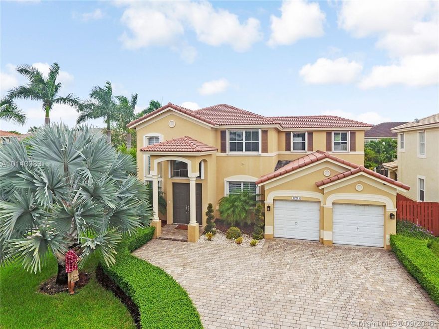 Absolutely gorgeous 4/3 corner home in prestigious Kendall Breeze. Walk into this stunning London Model upgraded to the max: wood & wrought iron in staircase, crown molding, marble & wood flooring, stainless steel appliances, granite countertops, wood cabinetry, light fixtures & ceiling fans, bedroom/bath downstairs, private backyard & pool, accordion hurricane shutters. Amenities:3 pools, 2 tot lots, 2 clubhouses, security patrol & alarm. Min. to FL Tpke, major roads, shopping, restaurants, A+ schools.