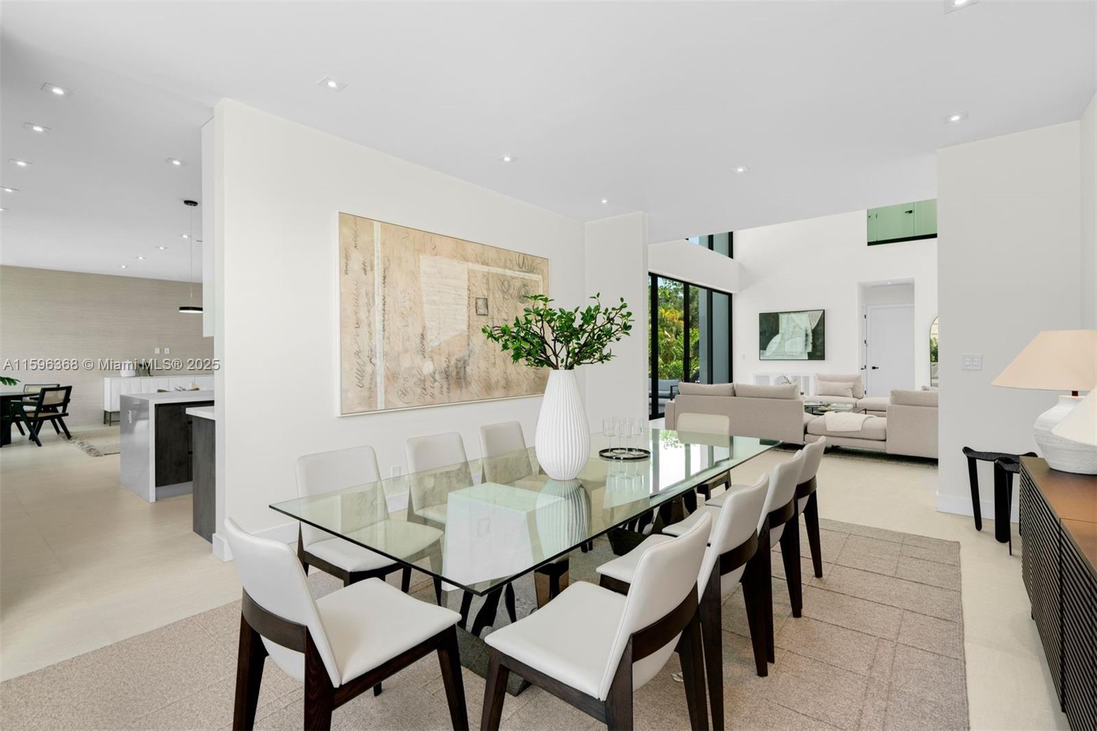 Introducing a stunning, just completed 6 bed, 6.5 bath residence on a beautiful corner lot in Miami Beach. This brand new home features soaring 21 ft ceilings in the living room, elegant Italian porcelain flooring, and a kitchen with quartz countertops and top-of-the-line Subzero & Wolf appliances. The Primary Bedroom showcases two private balconies, his & her closets, and a spacious bathroom. Additionally there are five bedrooms with ensuite bathrooms offering comfort and privacy. Outside, indulge in the saltwater pool, hot tub, and Italian porcelain decking. With a 5-car driveway and 2-car garage, this property offers both ample space and convenience. Enjoy proximity to top-rated schools, the beach, and 41st street shops and restaurants from this exquisite home.