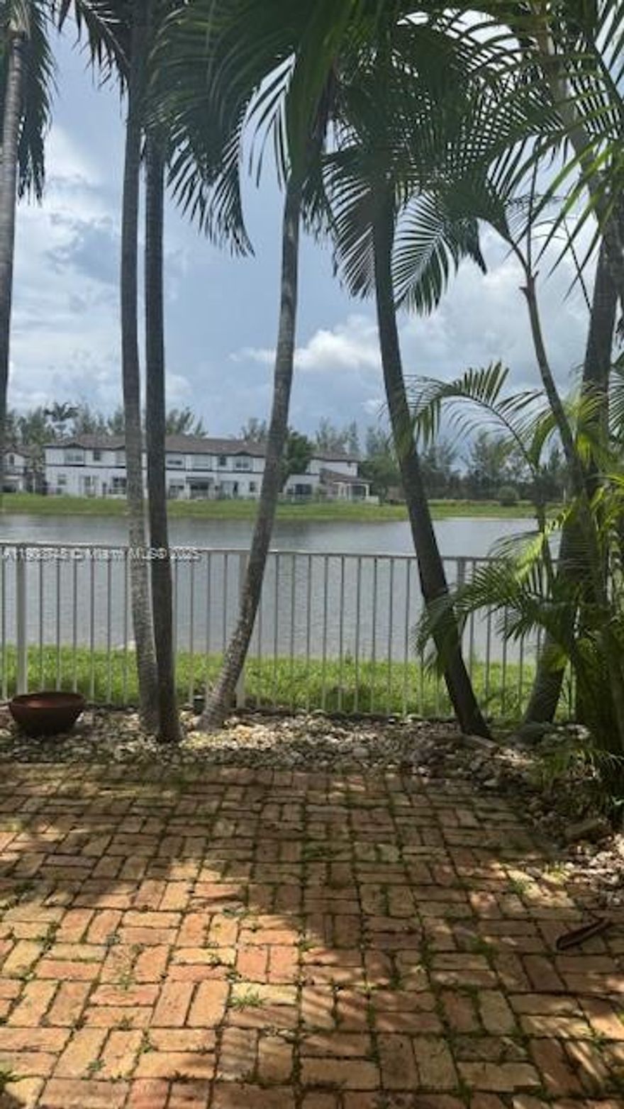 Beautiful Townhouse 3 bed 2.5 bath located at Islands at Doral, Windward, it has a backyard with awesome lake view and amazing sunsets, secure gated community and only 20 minutes from MIA International Airport. Unit Comes with washer and dryer on second floor, ready to move conditions The property includes a one-car garage, two drive way spaces, and additional guest parking. EASY TO SHOW!