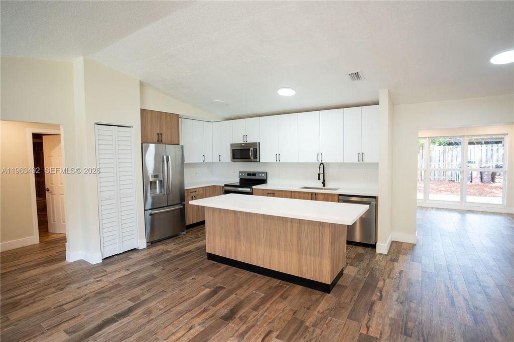 Photo of 8915 NW 26th Ct, Coral Springs, FL 33065 (MLS # A11983492)