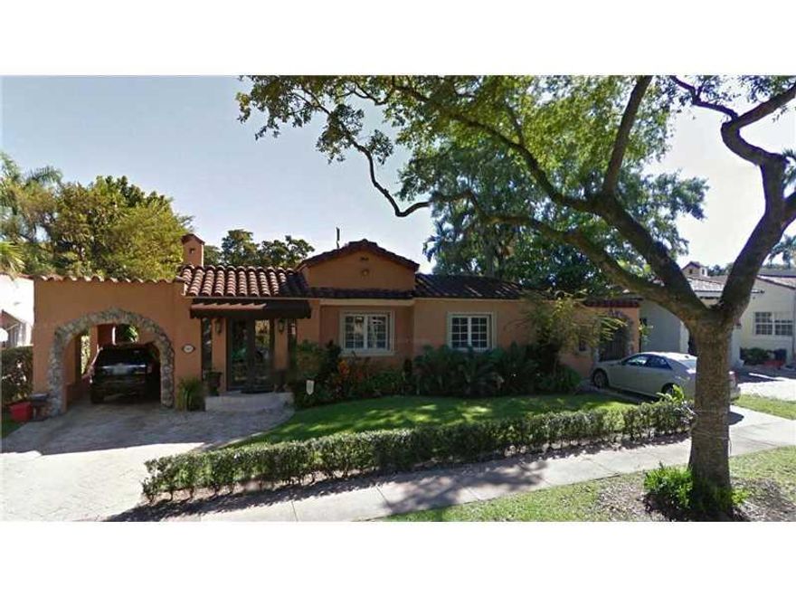 Beautifully updated old Spanish home minutes from downtown Coral Gables. Two master bedrooms, one currently used as an office, updated electrical and plumbing, wood and marble floors, crown moldings throughout, solid wood doors, walk-in closets, wood burn ing fireplace, custom wood kitchen cabinets and pantry, granite countertops, gas stove, SS appliances, covered terrace and outdoor BBQ/Kitchen