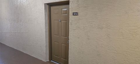 Photo of 215 SW 117th Ter #14104, Pembroke Pines, FL 33025 (MLS # A11882048)