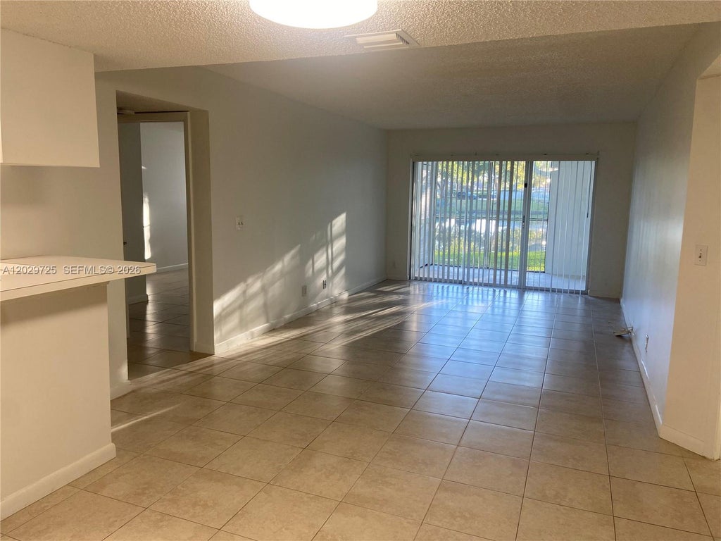 Photo of 9811 Westview Dr #913, Coral Springs, FL 33076 (MLS # A12029725)