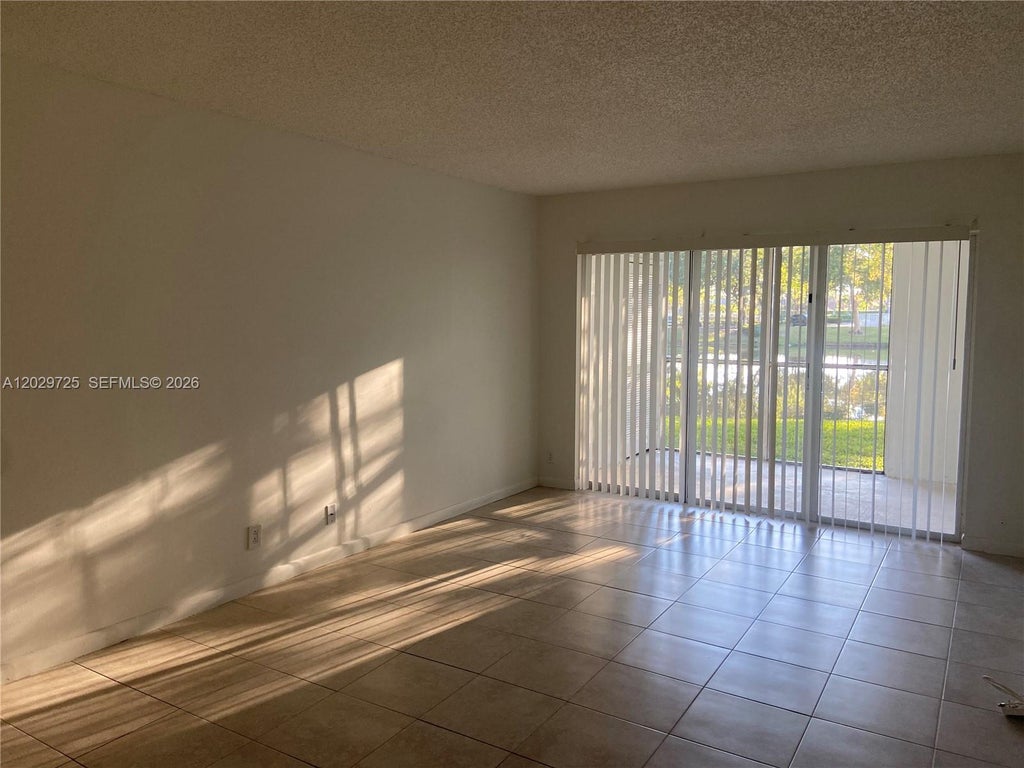 Photo of 9811 Westview Dr #913, Coral Springs, FL 33076 (MLS # A12029725)