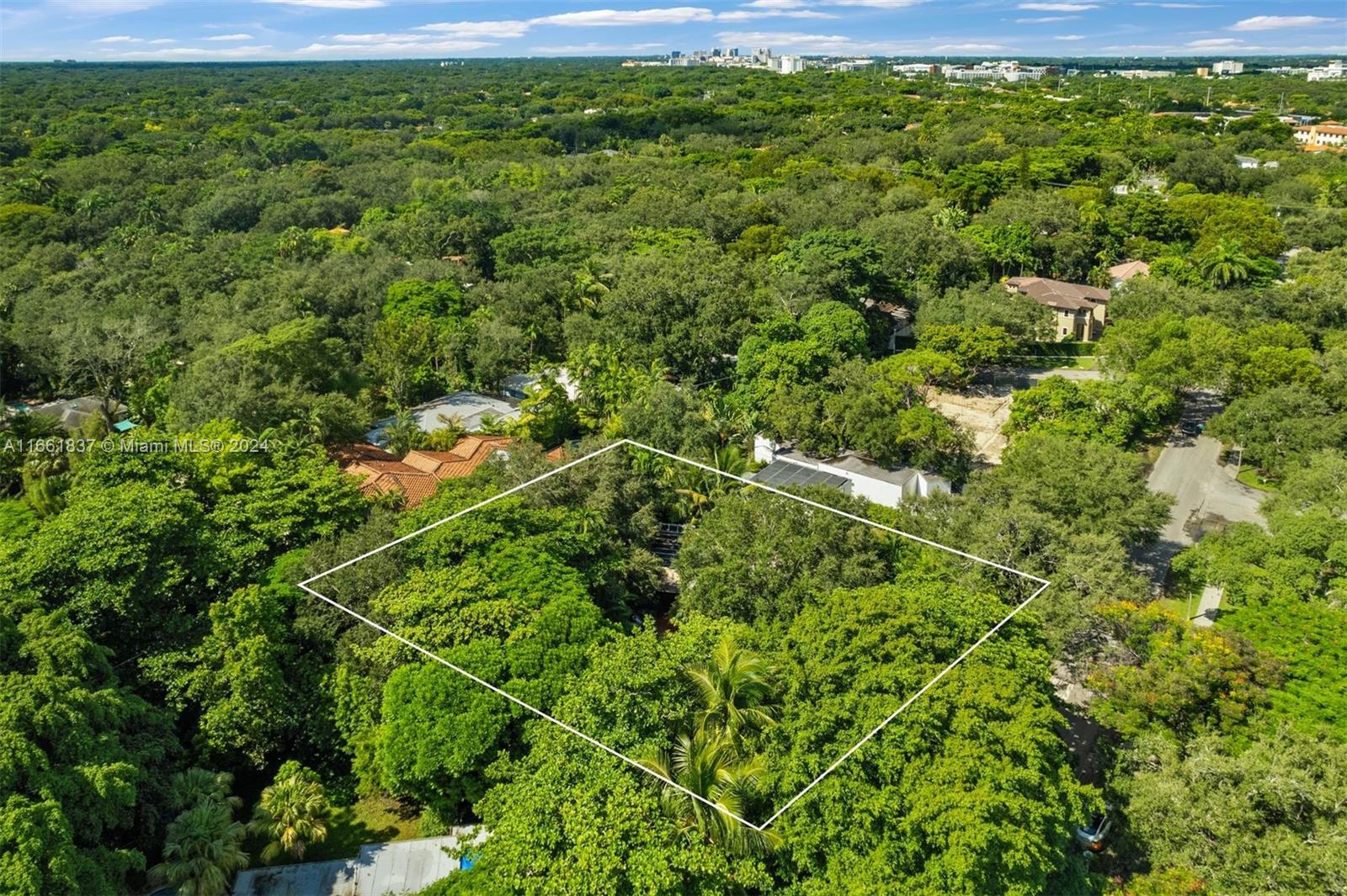 Nestled in the heart of one of Miami's most sought-after neighborhoods, this 6,050 square-foot corner lot in Coconut Grove offers a rare opportunity to build your dream home in a prestigious and tranquil setting. Surrounded by lush greenery and located just moments from Biscayne Bay, this property provides the perfect canvas for creating a private oasis. With close proximity to the Grove’s charming boutiques, fine dining, top schools, and vibrant cultural scene, you’ll enjoy the best of both worlds: a peaceful, tree-lined retreat with easy access to all that Coconut Grove has to offer. Don’t miss this chance to design and build in one of Miami's most exclusive enclaves.