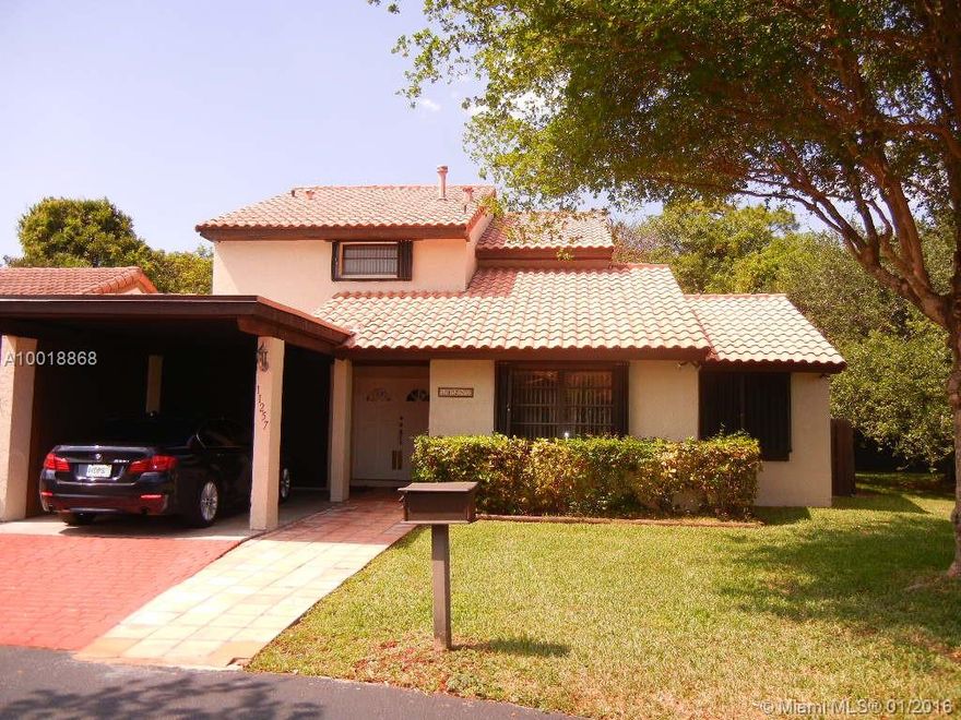 Back on the market. Gladewind Heights 3 Bedroom, 3 Bathroom Corner Home.  Located in a gated community, with a community pool, clubhouse, and exercise room.  Home features 1/1 downstairs and 2/2 upstairs. Nice size living area, dining room, and family room. Home per owner is larger than tax roll. 1947 sq ft (Ibis Model). Nice size patio with some green area.  Hurricane shutters throughout, recently painted. Great central location in Kendall. Close to shopping centers and schools.