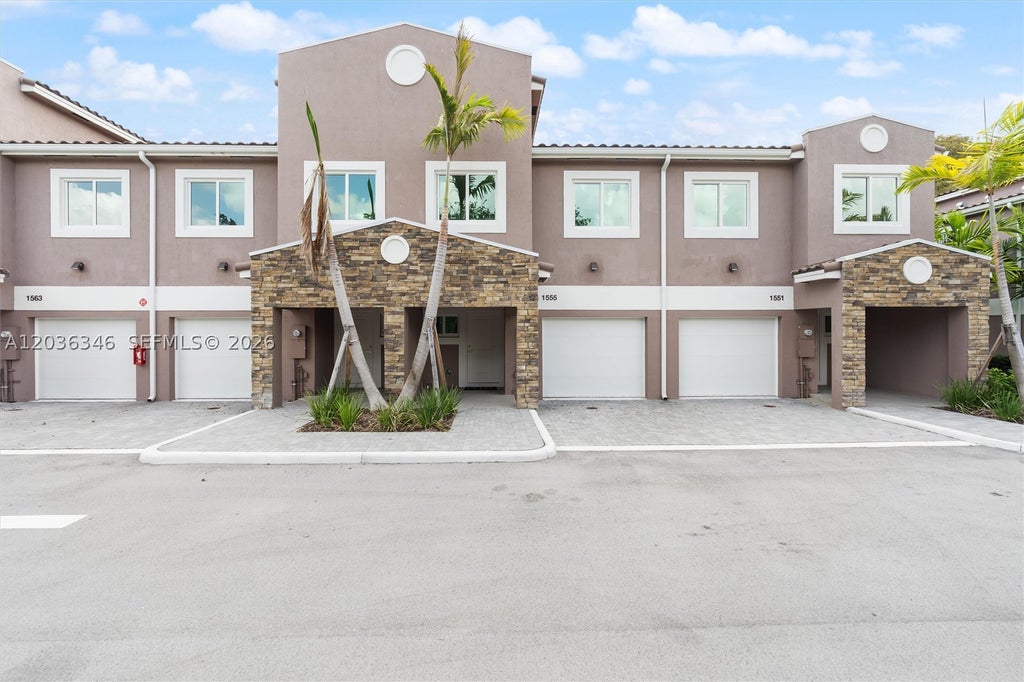 Photo of 1555 NW 94TH Way, Coral Springs, FL 33071 (MLS # A12036346)