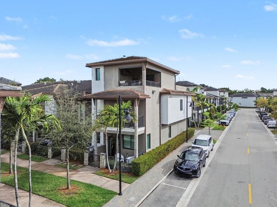 Welcome to this beautifully maintained 3-story townhouse in the highly sought-after Downtown Doral. Built in 2018, this home offers 4-bedrooms, 2 full baths and 2 half baths. It’s the perfect blend of modern style and everyday comfort. The 3 level layout creates an inviting atmosphere, ideal for both relaxing and entertaining. The spacious kitchen features all stainless steel appliances (Refrigerator is less than 1 year old) a large island breakfast bar, and plenty of storage. Great features such as all impact windows and doors, Rheem tankless water heater and 2 AC units. All bedrooms are located on the second floor with a washer and dryer for convenience. Third level provides flexible space for a home office, play area or media room as currently set up. Step outside to not one, but two private terraces—perfect for entertaining guests or simply unwinding and enjoying the outdoors. The 2-car garage adds convenience and extra storage. Residents have access to exceptional community amenities such as state-of-the-art fitness center, resort-style pool, clubhouse, basketball courts, splash pad, and more. Ideally located just minutes from top-rated schools, excellent dining, shopping, and everything Downtown Doral has to offer. This home combines comfort, convenience, and lifestyle! Don’t miss this incredible opportunity to own in the heart of Doral—call today to schedule your private tour.
