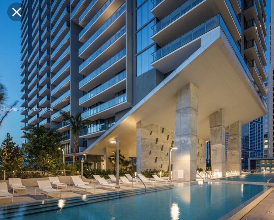 SPECTACULAR CORNER UNIT 2B / 2.5Bath in Brickell City Center, REACH is a 43-story tower designed by Arquitectonica, build in a rich, multi-cultural area. The building features an expansive, half-acre amenity deck which includes tropical gardens, barbecue grills, outdoor and indoor fitness areas, children's play area with 2 pools and 2 jacuzzis. Unit comes with floor to ceiling glass doors, modern Italian cabinetry with premium appliance package. Open balcony.
