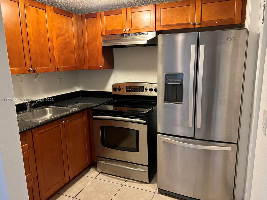 Photo of 4251 NW 5th St #103, Plantation, FL 33317 (MLS # A11774223)