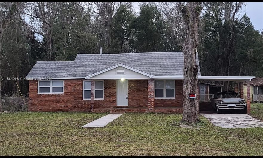 Totally remodeled 3 bedroom 2 bath with 1.43 acres ranch style living . Laminated floors, stainless steal appliances . Plenty of trees and country living at it best !