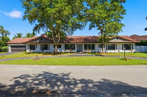 Photo of 9431 Sea Turtle Ln, Plantation, FL 33324 (MLS # A11903045)