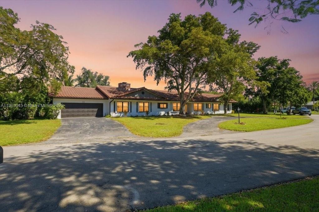 Photo of 9431 Sea Turtle Ln, Plantation, FL 33324 (MLS # A11903045)