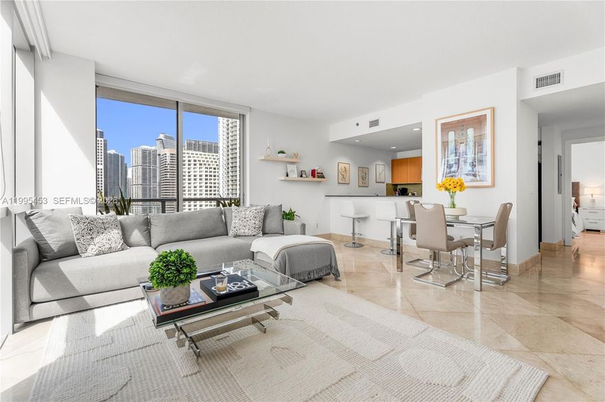 In the center of the city, 1060 Brickell is located at the core of Miami’s Financial District, with panoramic views over the city skyline. Residence 2117 is a lovely, light-filled corner unit with two spacious bedrooms, each with its own private bathroom, as well as a half bathroom just off the entrance foyer. With nearly 1,400 square feet, the residence was designed for comfortable everyday living, featuring a generous layout, two private balconies, impact windows, and a beautifully integrated kitchen that anchors the main living spaces. Living at 1060 Brickell places you close to Brickell’s most cherished restaurants, shops, and offices, offering a highly walkable lifestyle in one of Miami’s most connected neighborhoods. Residents also enjoy access to a wide range of amenities, including an elevated pool deck and walking area, fitness center, yoga studio, business center with conference room, private event room, golf simulator, massage treatment rooms, and valet service for guests. Please note that the pool deck is currently under construction.