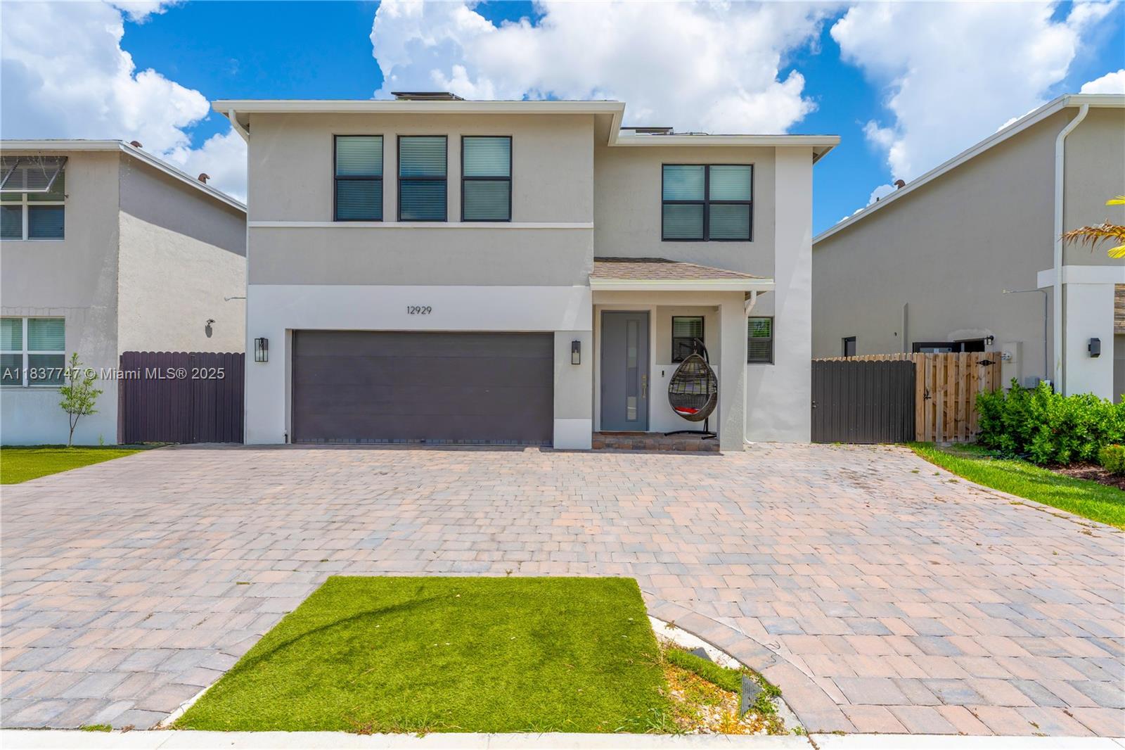 “This stunning brand-new modern home offers 5 spacious bedrooms, 3 full bathrooms, and 2 half baths. Designed with style and comfort in mind, it features open living spaces filled with natural light and a sleek contemporary layout. The property also includes a fully finished studio, perfect for generating extra income, using as a private guest suite, or even as a home office. A unique opportunity to enjoy modern living with added versatility.”