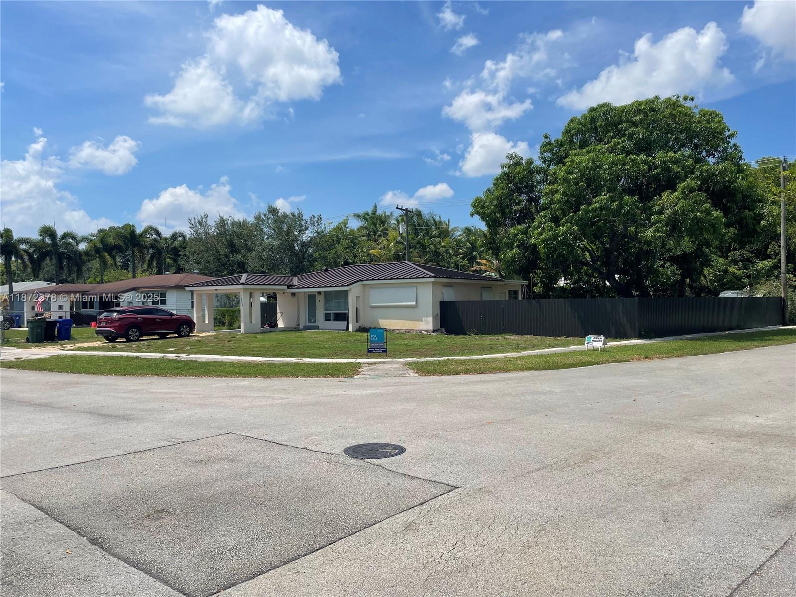 This beautiful home offers two spacious bedrooms plus a versatile room that can be used as a third bedroom. Flooded with natural light, set on an incredible corner yard, this property is ideal for anyone with equipment for outdoor projects