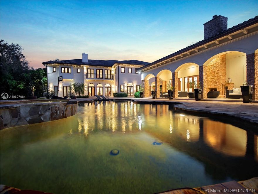 Absolutely Stunning N. Pinecrest Estate appointed with the finest finishes. This revamped contemporary estate is nested on a deep 1.2 acre lot with beautiful manicured landscaping. Enter A Spectacular Floor Plan Boasting over 14,000 Sq. of Amenities, from A Grand & Open Kitchen Featuring Viking Appliances, Elegant Living, Dining & Family Rooms, Climate Wine Cellar, 12 Seat Theater, 4 fire Places, a Grand Master Suite with Sitting Area, Home Office, & a Resort Style Master with Double Water Closets, Massive Closets, Elevator To a detached 2 bed/2 bath Guest or in-law cottage. Other Features: Smart Integration, Resort Style Pool, Large Impact La Finestra Impact Windows and Doors, Large Covered Summer Kitchen, 5 Car Garages, Large Motor Court, & Fully Gated. Premier Pinecrest Schools.