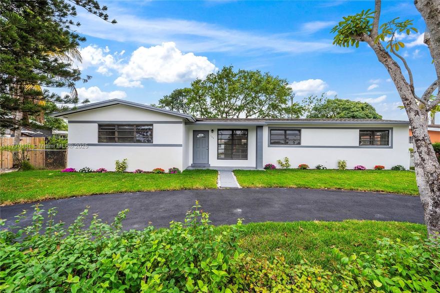 Experience the charm of modern living in this fully remodeled home filled with natural light, with a circular driveway, mature trees, on a quiet dead-end street. Featuring 2066 square feet of living space with sleek tile flooring throughout, a brand-new kitchen with state-of-the-art appliances, and a stylish dual-sink design, every detail exudes sophistication. The large walk-in shower adds a touch of spa-like luxury, making it the perfect retreat to call your own. This move-in ready property offers unbeatable convenience with quick access to I-95 and is just minutes away from Aventura. Nearby, you'll find top-rated schools, places of worship, grocery stores, and essential medical facilities, making it the perfect location for comfortable and connected living.