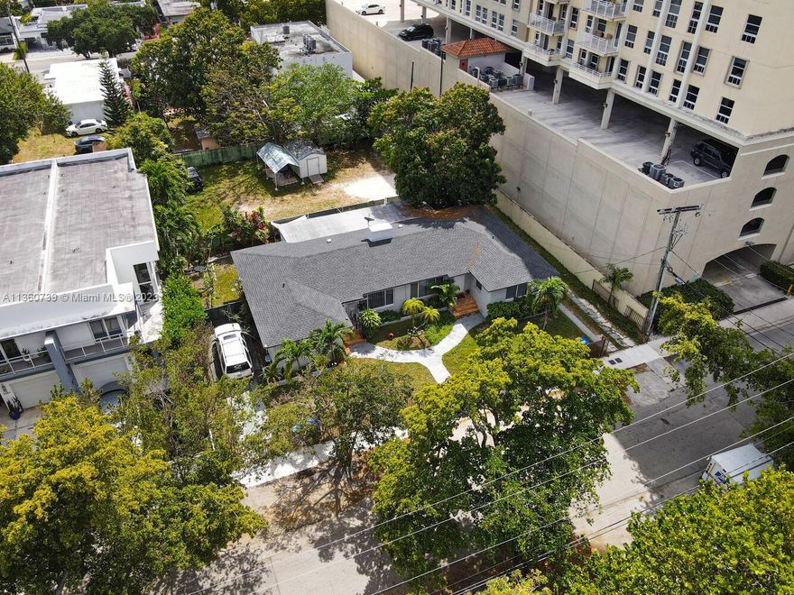 Great Investor/Developer opportunity. Well-maintained duplex on a 14,000 SF lot, located just blocks to shopping & dining on Miracle Mile in Coral Gables and close to the bayfront community of Coconut Grove. Current structure offers 2 rentable units (one is a 2BR/2BA and the other a 2BR/1BA). Both units are currently tenant occupied at below market rental values. Potential for rental income or for future development of multi-family structure. The lot is zoned T6-8-O (able to build a max of 48 units). Just a few minutes drive to MIA, downtown, Key Biscayne & the Beaches.