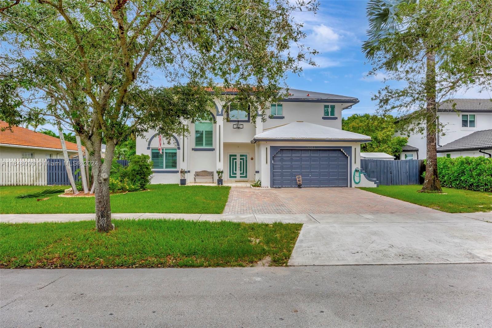 WOW! LOOK NO FURTHER! COMPLETELY RENOVATED LARGE POOL HOME. EVERYTHING WAS DONE AT THE HIGHEST LEVEL. FEATURING AN OPEN AND SPECIOUS LAYOUT, LOTS OF NATURAL LIGHT. NEW PORCELAINE FLOORING THROUGHOUT, HARD WOOD STAIRS. LUXURY KITCHEN WITH COMBINATON OF WOOD AND QUARTS COUNTER TOPS, FREE STANDING ISLAND, NEW STAINLESS STEEL APPLIANCES. LARGE PRIMARY BEDROOM WITH NEW MARBLE TILE IN BATHROOM. NEW TILE ROOF IS IN PROCESS OF BEING REPLACED. SMART HOME EQUIPPED WITH EV PLUG, SMART LIGHTING, SMART DOOR LOCK, SMART AC THERMOSTAT. TRIPLE IMPACT WINDOWS AND DOORS, PLANTATION WINDOW TREATMENTS. AMAZING BACK YARD, CLIMATE CONTROL POOL AND JACUZZI, NEW POOL AND PATIO TRAVERTINE DECK, FOR YOUR ENJOYMENT AND HOSPITALITY. A MUST SEE!