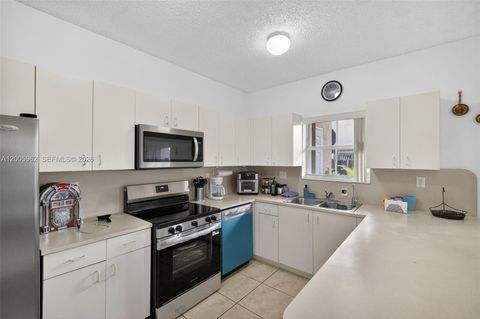 Tiny photo for 16624 NW 73rd Ct #16624, Miami Lakes, FL 33014 (MLS # A12005962)