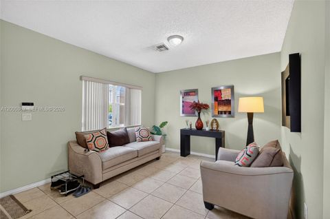 Tiny photo for 16624 NW 73rd Ct #16624, Miami Lakes, FL 33014 (MLS # A12005962)