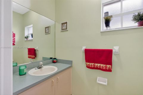 Tiny photo for 16624 NW 73rd Ct #16624, Miami Lakes, FL 33014 (MLS # A12005962)
