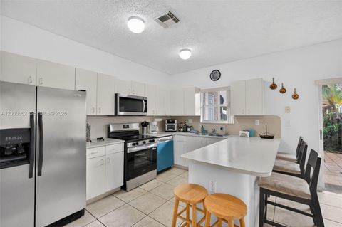 Tiny photo for 16624 NW 73rd Ct #16624, Miami Lakes, FL 33014 (MLS # A12005962)