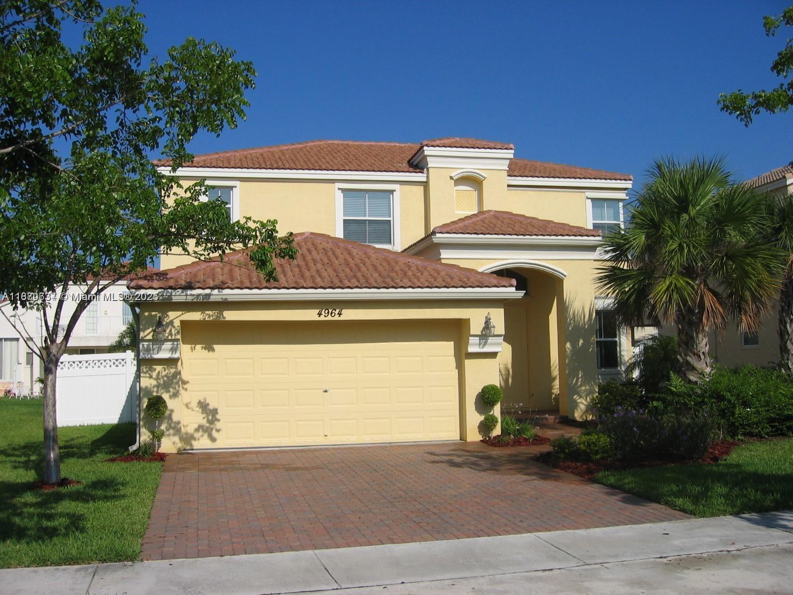 Spacious 4 Beds/3 Bath + Den, Alhambra model within Riviera Isles. The home is beautifully painted & kept in like-new condition. The master suite opens to a private den (the fifth room)—a downstairs bedroom/bath. The kitchen features raised cabinets & upgraded appliances. The home features 20x20 neutral tiles throughout the first floor and faux wood flooring on the second floor, along with a fenced yard and a paver patio. The community features a 5-star clubhouse with a fitness center, basketball & tennis courts, playgrounds, and a pool. Great schools. Easy access to I-75
