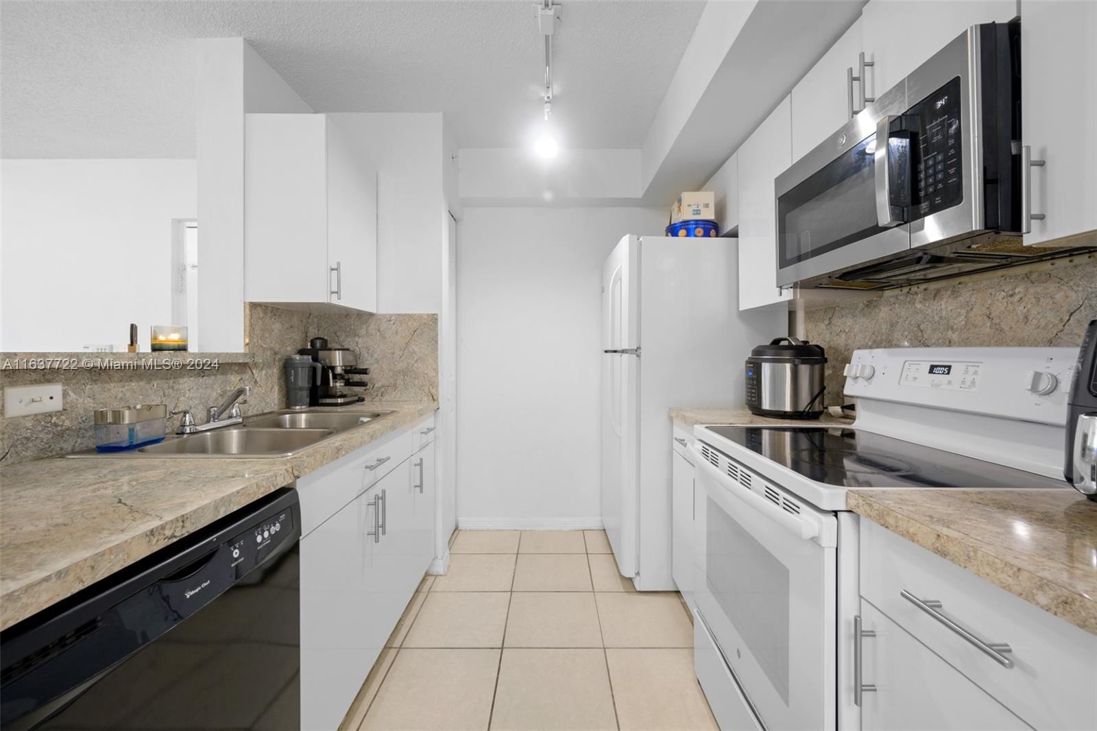 DEVONAIRE CONDO AT PEMBRO - Residential