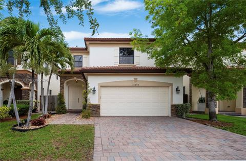 Photo of 10045 NW 86th Ter, Doral, FL 33178 (MLS # A12002325)