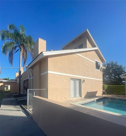Photo of 4075 Coral Springs Dr #5, Coral Springs, FL 33065 (MLS # A11712566)