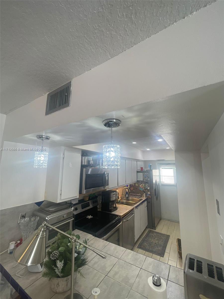 HAYLOFTS OF CORAL SPRINGS - Residential