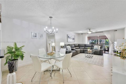 Photo of 1301 SW 142nd Ave #203H, Pembroke Pines, FL 33027 (MLS # A11901609) Photo of 1301 SW 142nd Ave #203H, Pembroke Pines, FL 33027 (MLS # A11901609)