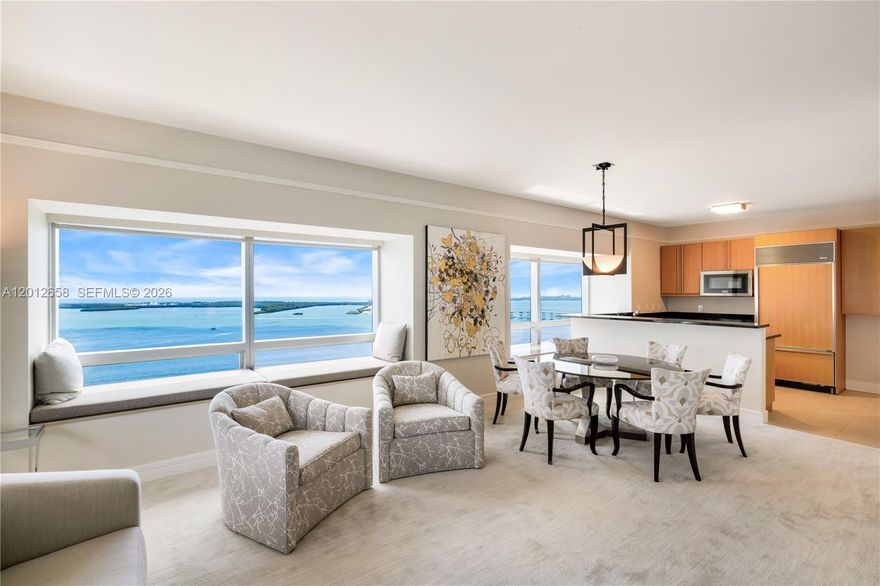 Positioned high above Brickell, this bright, refined residence captures sweeping bay views through expansive picture windows that frame the water like artwork. The open living and dining areas are designed to maximize light and scale, creating an inviting setting for both everyday living and entertaining. The kitchen is appointed with sleek cabinetry, stone countertops, and premium appliances, seamlessly integrated into the main living space. The primary suite offers a serene retreat with generous closet space and a spa-inspired bath, while additional bedrooms provide flexibility for guests or a home office. Residents enjoy access to the Four Seasons’ world-class amenities, including resort-style pools, Equinox fitness center, full-service spa, concierge, and 24-hour security—all within the heart of Brickell.