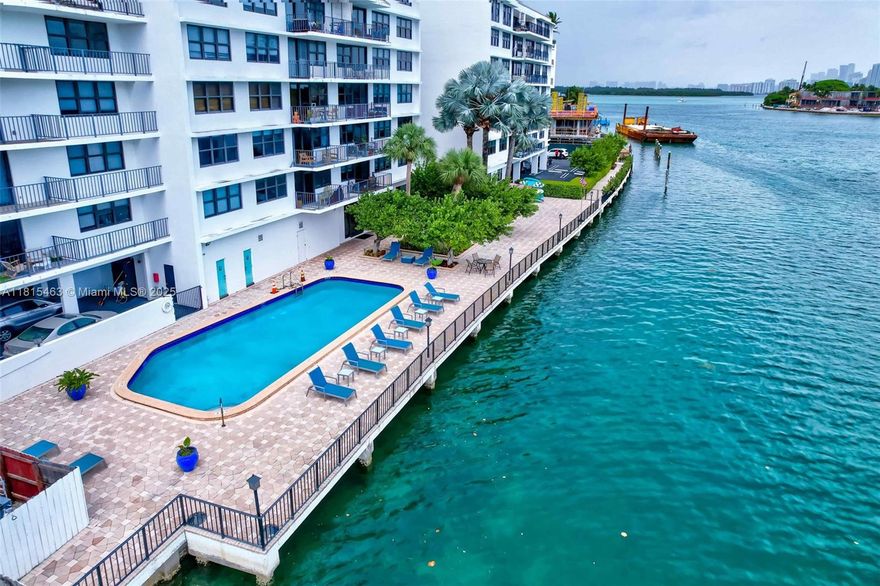 Bright and Spacious 2-Bed, 2-Bath Condo with Stunning Sunset Views. Welcome to The Belmont, a boutique 7-story waterfront building in the highly desirable Bay Harbor Islands. Enjoy spectacular sunset views from your living room or relaxing  in the canal front pool.  You will feel the tranquility of island living while being just a short walk to the beach, top-rated restaurants, shopping, and 10 minute drive from highly acclaimed Grade A K-8 school. New kitchen appliances, new A/C, impact windows, storage and bike room.  Fees cover water, electricity (FPL), cable, internet and insurance for value and convenience. Experience a rare blend of privacy, location, and amenities in one of Miami's most sought-after neighborhoods.