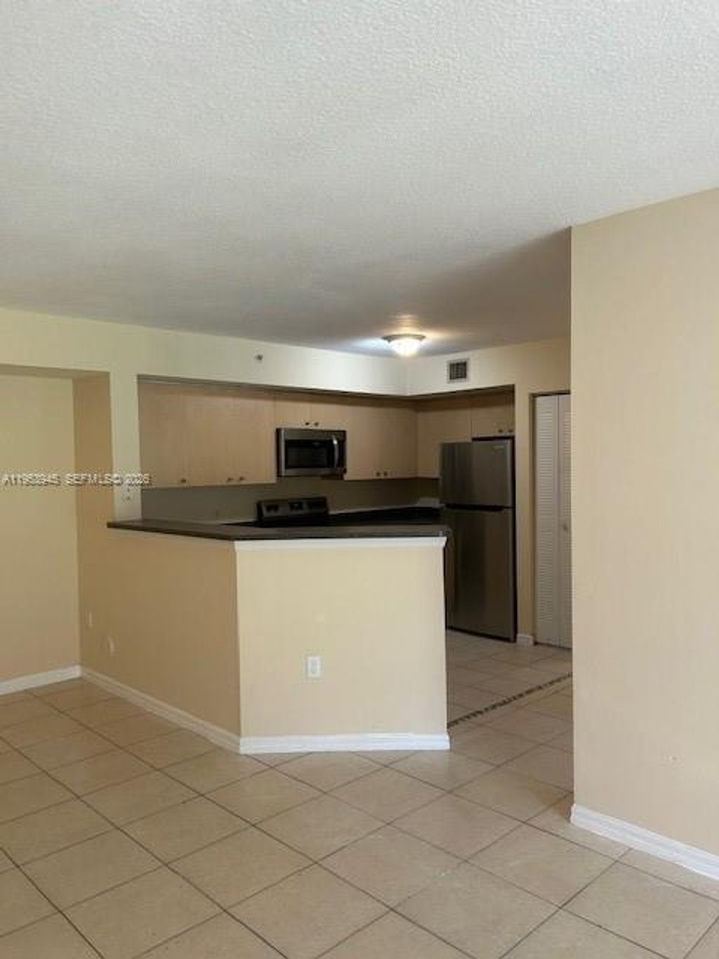 Photo of 4021 San Marino Blvd #107, West Palm Beach, FL 33409 (MLS # A11953945)