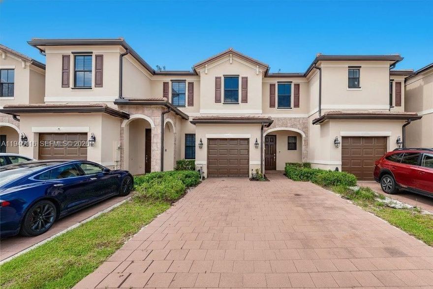 Experience resort-style living in this stunning 3-bedroom, 2.5-bathroom waterfront townhouse in the prestigious gated community of AquaBella. Built in 2021, this modern home features a spacious open floor plan with high-end finishes, a contemporary kitchen with stainless steel appliances, and sleek tile flooring throughout the main level. Enjoy serene lake views from your private patio—perfect for morning coffee or sunset relaxation. Residents gain access to world-class amenities including two deluxe clubhouses, a resort-style pool, a fully equipped fitness center, and 24-hour guarded security. Conveniently located near I-75 and Florida’s Turnpike for an easy commute. This is South Florida living at its finest!