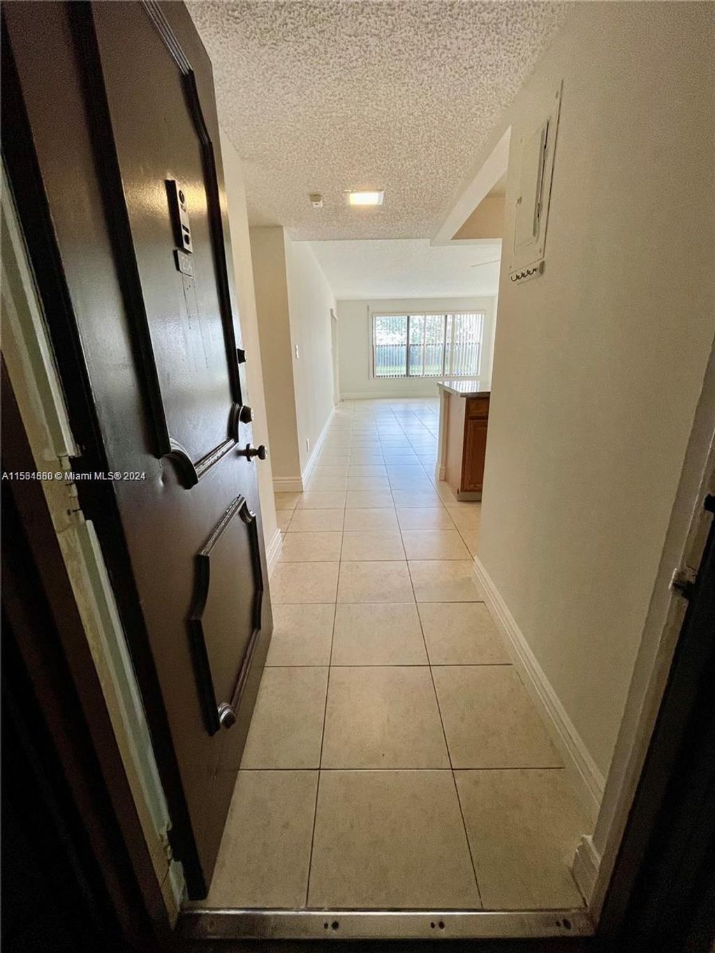 Photo of 2320 S Cypress Bend Dr #204, Pompano Beach, FL 33069 (MLS # A11564880)