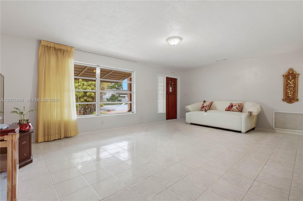 Photo of 4901 NW 53rd St, Tamarac, FL 33319 (MLS # A12025894)