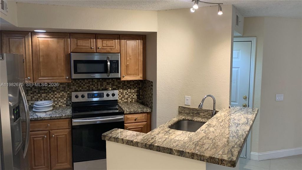 Photo of 1401 Village Blvd #1615, West Palm Beach, FL 33409 (MLS # A11982675)