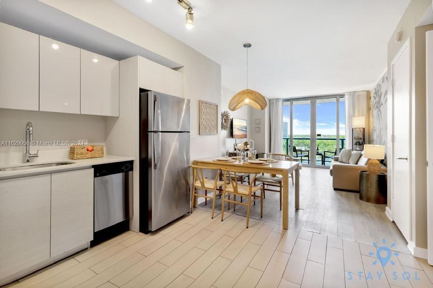 Just reduced $ 65k for a quick sale !!! Beautiful unit  professionally decorated, furnished and equipped. 2 bedroom 2 bathroom unit, ready to use or rent for AIRBNB or short term lease (daily, weekly, monthly). No rental restrictions. It can be rented with hotel program or privately. Located at Beachwalk Resort right across the beach, Unit can be rented together as a 2/2 or separate as One Bedroom with living room & Kitchen, and Studio with 2 private entrances. Private pool for owners at the roof top. Maintenance fee includes Cable TV, internet, water, all amenities (pool, fitness center) and electricity.