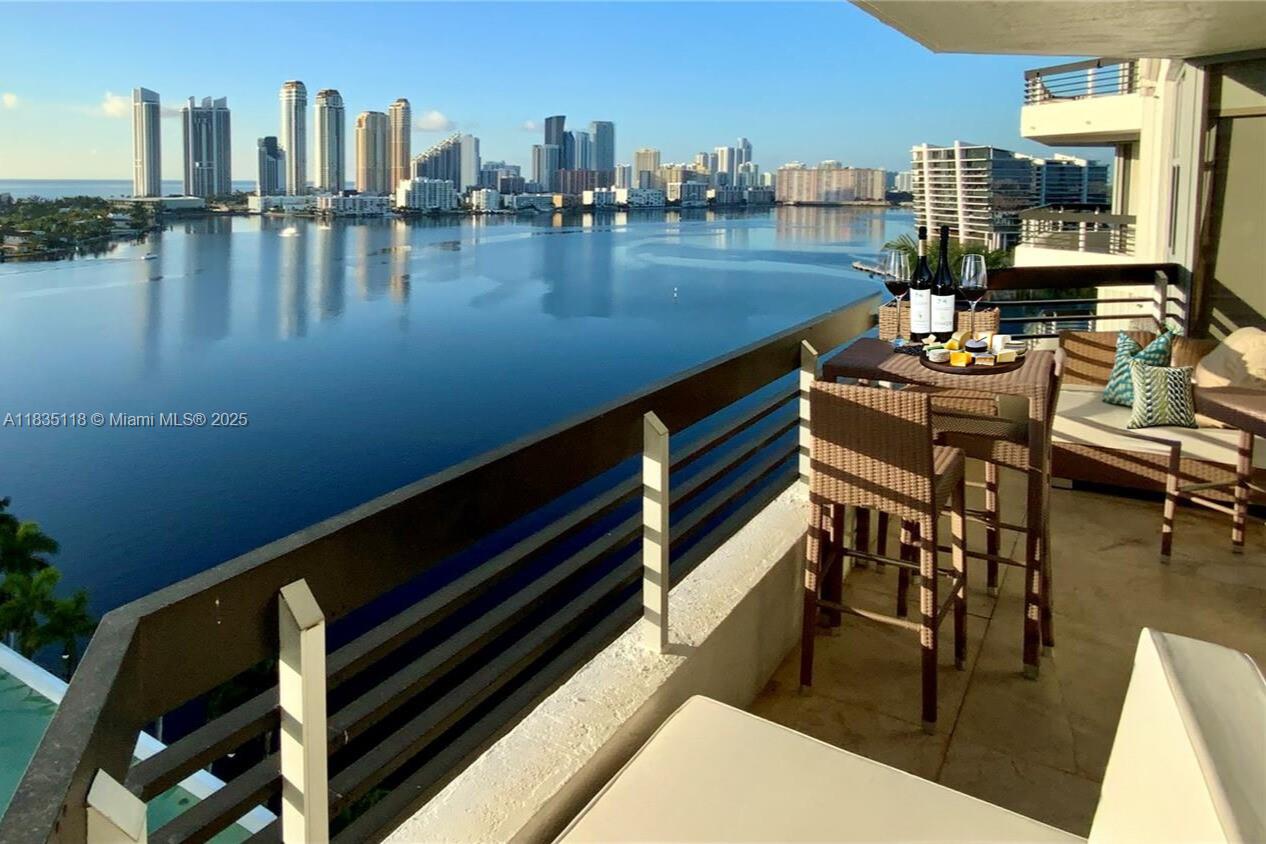 Live in the best tower of Mystic Pointe!Turnkey residence 2Bed-2.5 Baths residence w/unparallel water views as you enter.Beautifully furnished & designed w/high-end furniture providing an unmatched living experience.Sensational costum made open kitchen w/top-tier appliances. Unit boasts a water treatment system,ensuring purified water from every sink.Spacious layout w/marble flooring.From your terrace, indulge in the breathtaking views of the ocean & intracoastal day+night.Resort-style living including a stunning intracoastal pool,gym,tennis pickellball+basketball courts.Enjoy the convenience of an on-site supermarket,marina,shops & italian restaurant.24-hour security,5 minutes to the beach walking distance to houses of worship.Truly one-of-a-kind home at a Prestigious Aventura location.