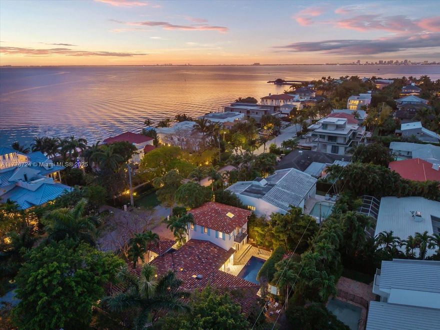 Your tropical private retreat on exclusive Mashta Island. This 6 bed / 5 bath, 3,245 SF Mediterranean villa sits on a spacious 10,000 SF lot with lush landscaping, a resort-style pool, and a private cabana guest suite. Interiors with soaring 10-foot ceilings flow seamlessly to the outdoors, perfect for entertaining and relaxed island living. Intentionally designed with two primary suites (first floor and second floor) enhancing comfort and privacy. The chef’s kitchen features a gas stove, cooking island, and SubZero refrigerator. Enjoy private balconies, a circular driveway, an attached 2-car garage with laundry, covered porches, and generous storage. Key Biscayne offers the ultimate family lifestyle with world-class amenities and a true sense of community.